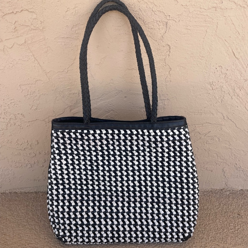 Olivia Tote. Never been uses, brand new. Perfect condition.